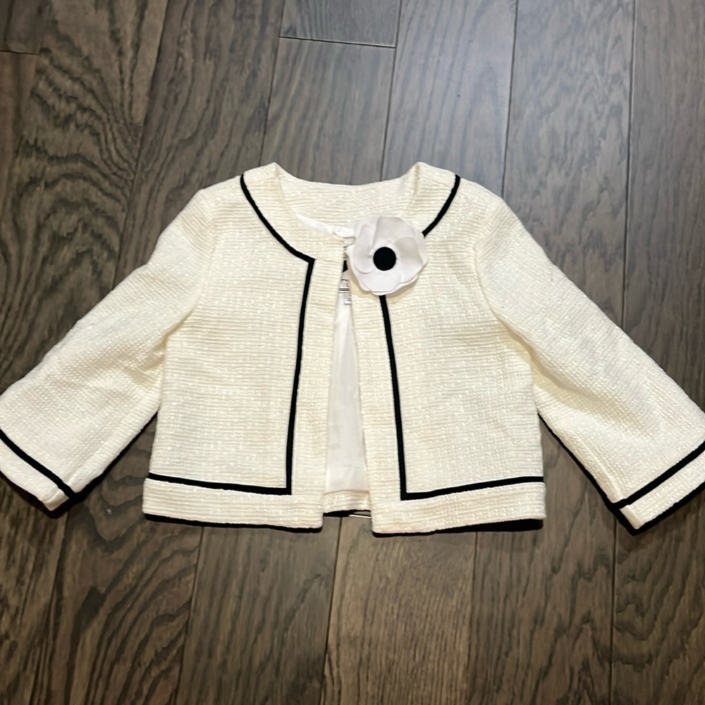 Janie and Jack blazer size 6. Cream and black with flower detail.